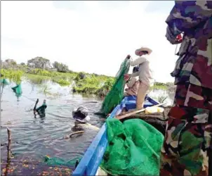  ?? SUPPLIED ?? Authoritie­s crack down on fisheries crimes on the Tonle Sap Lake in 2022.