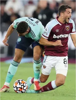  ?? GETTY IMAGES ?? RED CARD: Ayoze Perez was sent off for this challenge on West Ham’s goalscorer Pablo Fornals five minutes before half-time