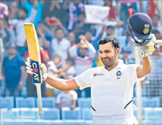  ?? PTI ?? ■
Rohit Sharma acknowledg­es the crowd after reaching his double century on the second day of the third Test against South Africa in Ranchi on Sunday.