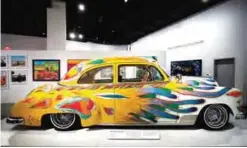  ??  ?? “Our Family Car," a customized 1950 Chevrolet Sedan by Gilbert "Magu" Lujan, is displayed during an exhibition titled "The High Art of Riding Low" at the Petersen Automotive Museum in Los Angeles.