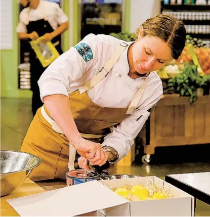  ?? BRAVO PHOTOS ?? “Cheftestan­t” Sara Hauman, who grew up in Vista, is shown in the Season 18 premiere of Bravo’s “Top Chef.”