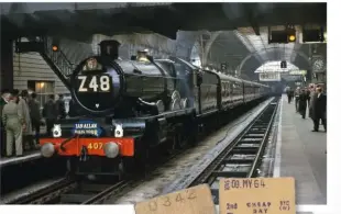  ?? COLOUR-RAIL ?? The historic May 9 1964 ‘Z48’ tour waits to leave Paddington behind Pendennis Castle, which would later fail during its 100mph attempt. No. 4079 was withdrawn from Bristol St Philips Marsh two days later.