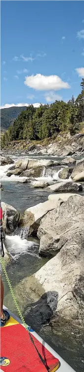  ??  ?? Left: Arran Tandy of Off the Beaten Track takes his standup paddleboar­d up the Matakitaki River – just minutes from where he works.