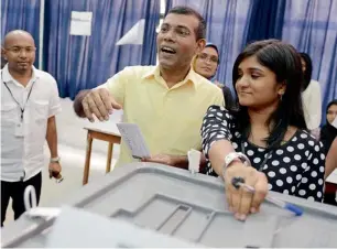 ?? Reuters ?? Mohammed Nasheed casts his vote at a polling station in Male on Saturday. —
