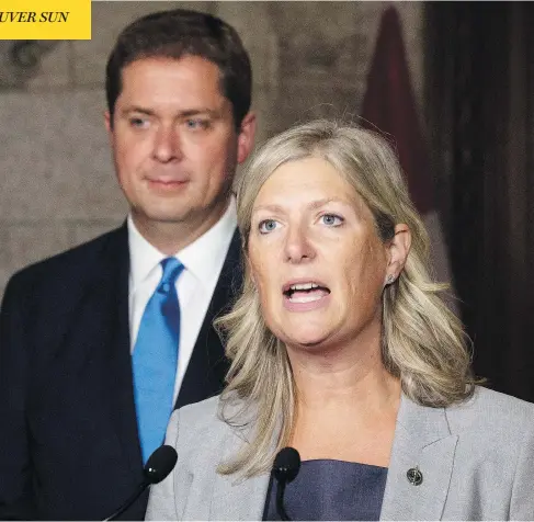  ?? ADRIAN WYLD / THE CANADIAN PRESS ?? “I look forward to working with my Conservati­ve colleagues who are unafraid to do the real work,” said former Liberal MP Leona Alleslev on Monday, with Conservati­ve Leader Andrew Scheer at her side.