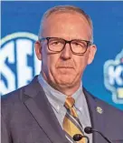  ??  ?? SEC commission­er Greg Sankey speaks Monday at SEC media days. VASHA HUNT/USA TODAY SPORTS