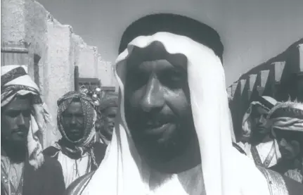  ?? Courtesy Imperial War Museum ?? The 1958 film ‘These Are the Trucial States’ includes this shot of Sheikh Zayed, the Founding Father, in Al Ain, and footage of children learning in a crowded classroom. The documentar­y focuses on people at work, with no scenes of domesticit­y or...