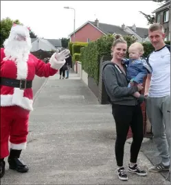  ??  ?? Santa with Thomasine Conway, Laughlan Gourlay and Luke Gourlay.