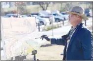  ?? (NWA Democrat-Gazette/J.T. Wampler) ?? Barry Thomas of North Little Rock paints a picture Thursday during the ribbon cutting ceremony for the Arkansas Game and Fish Commission’s J.B. and Johnelle Hunt Family Ozark Highlands Nature Center in Springdale.