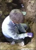  ?? JOHANNES KRAUSE, THE ASSOCIATED PRESS ?? A researcher samples sediment at an archeologi­cal site in Belgium.