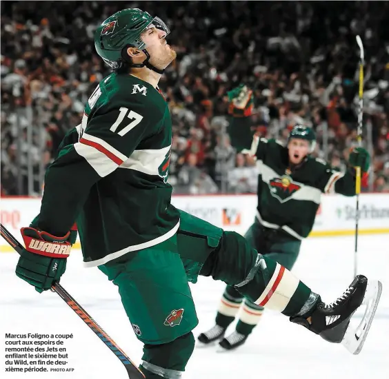  ?? PHOTO AFP ?? Marcus Foligno a coupé court aux espoirs de remontée des Jets en enfilant le sixième but du Wild, en fin de deuxième période.