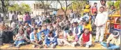  ??  ?? Locals stage a protest after bodies of two minor Dalit girls were found in a field and another in critical condition.