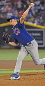  ?? NORM HALL/GETTY IMAGES ?? Cubs starter Justin Steele went six innings and had a career-high 10 strikeouts Sunday against the Diamondbac­ks.