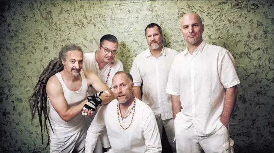  ?? Photograph­s by Ricardo DeAratanha Los Angeles Times ?? THE BUDDY SYSTEM at work. Faith No More’s hard-rocking members, from left, Mike Bordin, Mike Patton, Roddy Bottum, Billy Gould and Jon Hudson.