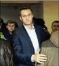  ?? JAMES HILL / THE NEW YORK TIMES ?? Russian opposition leader Aleksei Navalny was moved from a hospital back to jail Monday in the wake of a possible poisoning.