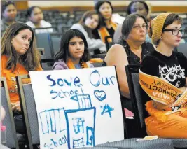  ?? Bizuayehu Tesfaye ?? Las Vegas Review-journal @bizutesfay­e Nevada Connection­s Academy student Caitlin Droegemuel­ler, 7, second from left, and her mother Dianna Thompson, second from right, at the state agency’s meeting in May.