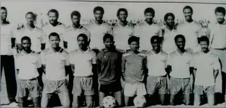  ?? ?? Spiderman... Bossie (5th from left front row) with the star-studded NSSL Invitation­al Eleven. Back row from left: Oscar Mengo (coach), Mike Peterson, George Gariseb, Bandi Namaseb (d+), Riva Jakonia, Rusten Mogane, Indies Damaseb, Justice Basson, Billy Tuahepa (d+), Stigga Kozonguizi (team manager). Juku Tjazuko (d+), Dawid Snewe, Doc Hardley (d+), Lesley Basson, Mabos Vries, Koko Muatunga, Mentos Hipondoka, Erich Muinjo (d+).