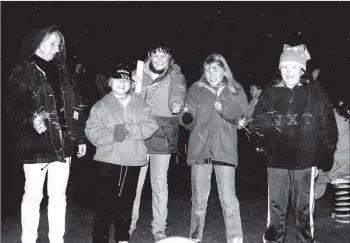  ?? 01_B46twe04 ?? Youngsters in Brodick enjoy sparklers, a huge bonfire and hot soup at a Bonfire Night celebratio­n which was one of many held across the island last Thursday.