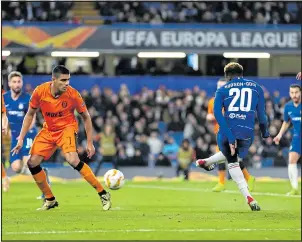  ??  ?? THREE AND EASY: Hudson-Odoi adds a third goal to Giroud’s earlier double