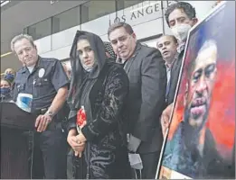  ?? Wally Skalij Los Angeles Times ?? LAPD Chief Michel Moore meets with community leaders after a vigil for George Floyd, whose death has sparked demonstrat­ions around the nation.