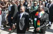  ?? ?? President Mnangagwa and President Nyusi greet ZANU PF supporters gathered to welcome the visiting head of state at RGM Internatio­nal Airport in Harare yesterday