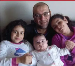 ?? FAMILY PHOTO ?? Abdelkrim Hassane with his daughters Yamina, Sarah and Sofia. “When the apartment is empty . . . that’s when they’ll feel the absence of their father,” a family friend says.