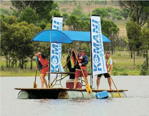  ?? Pictures: GREG HEATH ?? HARD-WORKING WINNERS: In first place at the Anything That Floats race, which took place over the weekend, were Komani Plumbing.