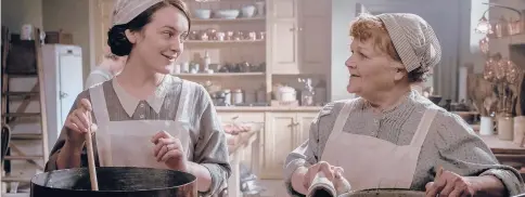  ?? BEN BLACKALL/FOCUS FEATURES ?? Sophie Mcshera, left, as Daisy and Lesley Nicol as Mrs. Patmore in “Downton Abbey: A New Era.”