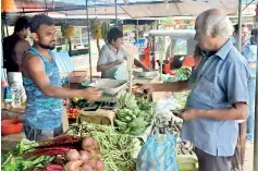  ??  ?? Rising veggie prices stand in contrast to few months ago when there was a glut of vegetables and farmers dumped them because they were getting low prices. Pix by Athula Devapriya