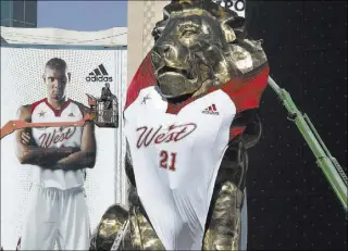  ??  ?? The MGM Grand lion is outfitted with a West team jersey for the 2007 NBA AllStar Game, the first such showcase to be held in a non-NBA team city.