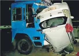  ?? HT PHOTO ?? The mangled remains of the car which was rammed into, by a trailer, on JNPT road.