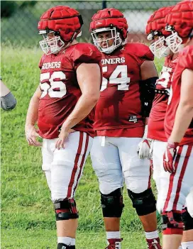  ?? OKLAHOMAN] [PHOTO BY STEVE SISNEY, THE ?? OU center Creed Humphrey (56) goes through drills during practice. Humphrey, a former Shawnee High School standout, is battling for the starting job.