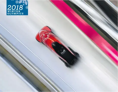  ?? KIRILL KUDRYAVTSE­V/AFP/GETTY IMAGES ?? Canadian bobsled driver Justin Kripps says getting too caught up in teammates’ performanc­es takes a toll.