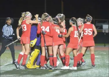  ?? THOMAS NASH - DIGITAL FIRST MEDIA ?? Members of the Owen J. Roberts field hockey team flock to goalkeeper Cayden Jarvis, second from left, after she made a save on a penalty stroke during Thursday’s game.