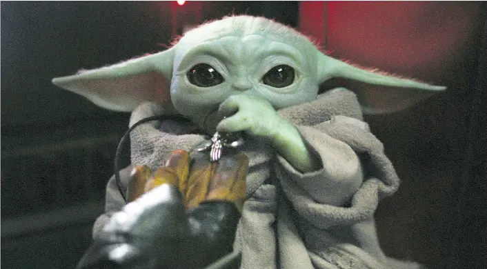  ??  ?? Der US-Medienries­e Disney startet in der Nacht auf Dienstag um punkt null Uhr seinen Streamingd­ienst. Mit dabei die Kultfigur Baby Yoda aus „Star Wars: The Mandaloria­n“.