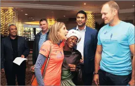  ?? Picture: CINDY WAXA/ANA PICTURES ?? STAR POWER: Elana van Zyl-Meyer embraces fellow running star Blanche Moila at the Cape Times Captain’s Challenge Breakfast with (left) Heart 104.9FM breakfast show host Aden Thomas, Coca Cola Peninsula Beverages Marketing Activation­s Manager Dan Davis,...