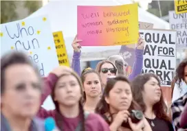  ?? Pic AFP/ FREDERIC J. BROWN ?? Women are joined by supporters of women's rights for a strike, march and rally along the streets of downtown Los Angeles, California on March 8,2018 to celebrate Internatio­nal Women's Day.