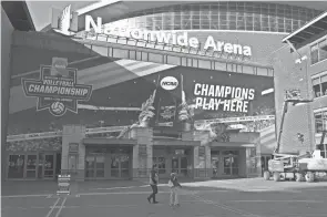  ?? KYLE ROBERTSON/COLUMBUS DISPATCH ?? A sign hangs outside the entrance of Nationwide Arena before the NCAA Division I Women's Volleyball Championsh­ip in Columbus on Tuesday.