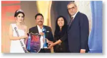  ??  ?? The award was given to Parry Travels and received by Laxmi Angara, BU Head