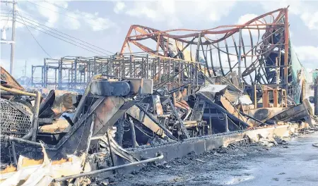  ?? FILE/THE TELEGRAM ?? A massive fire destroyed the O'donnell's fish plant Oct. 26, 2018.