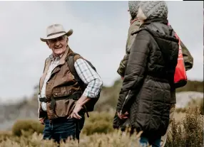  ??  ?? FROM LEFT: Local historian Ken Bell regales walkers on the Bogong High Plains’ Trails, Tales and Tucker tour; Enjoy a lunch on tour made with North East produce.