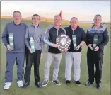  ?? ?? Dunaverty Golf Club captain Donald Brown (Southend), centre, with the winners, from left: Kenny Cameron, Scott Cameron, Ross Sinclair and Roddy MacDonald.