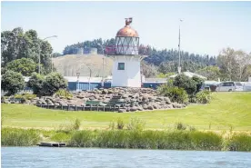  ?? Photo / File ?? The picturesqu­e lighthouse on Wairoa’s Marine Parade is one of the area’s attraction­s.