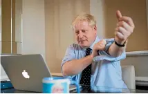  ?? AP ?? As Prime Minister Boris Johnson rolls up his sleeves in preparatio­n for an early election, his Conservati­ve Party has hired New Zealand digital gurus Sean Topham and Ben Guerin – whose efforts in Australia saw the Liberals outclass Labor online at the May federal elections.