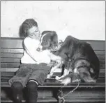  ?? CHICAGO TRIBUNE HISTORICAL PHOTO ?? Tommy Templeton is reunited with his dog Prince, who had been lost, in this undated photo.