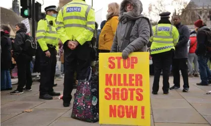  ?? ?? Anti-vaxxers protesting in London on 8 December. Photograph: Thomas Krych/Sopa Images/Rex/Shuttersto­ck