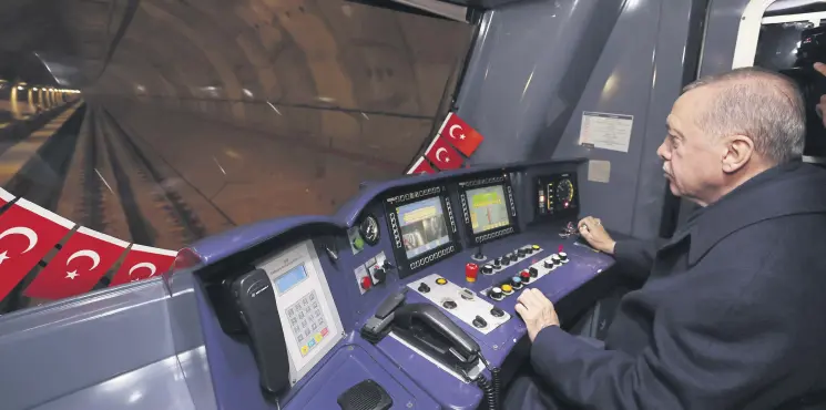  ?? ?? President Recep Tayyip Erdoğan helms a metro train he inaugurate­d in Istanbul, Türkiye, March 10, 2024.