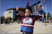  ?? DAVID ZALUBOWSKI/THE ASSOCIATED PRESS ?? Ten-year-old Greyson Goldstein stands outside Ball Arena before the opening game of the Stanley Cup Final between the Tampa Bay Lightning and the Colorado Avalanche on Wednesday, June 15, in Denver.