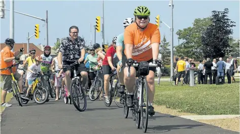  ?? JULIE JOCSAK/STANDARD STAFF ?? The Niagara Region and the City of Thorold officially opened a new multi-use trail on Decew Road and Merrittvil­le Hwy on Wednesday.