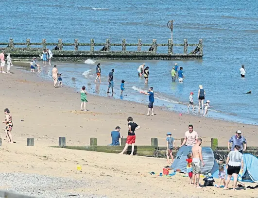  ??  ?? TAPS AFF: Temperatur­es have been soaring this week throughout the north-east of Scotland and us Scots aren’t used to it.